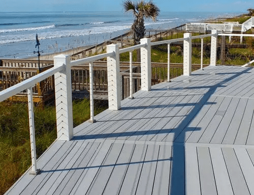 White Non-Routed Vinyl Railing and 6×6 Post Sleeves with a third-party cable rail system